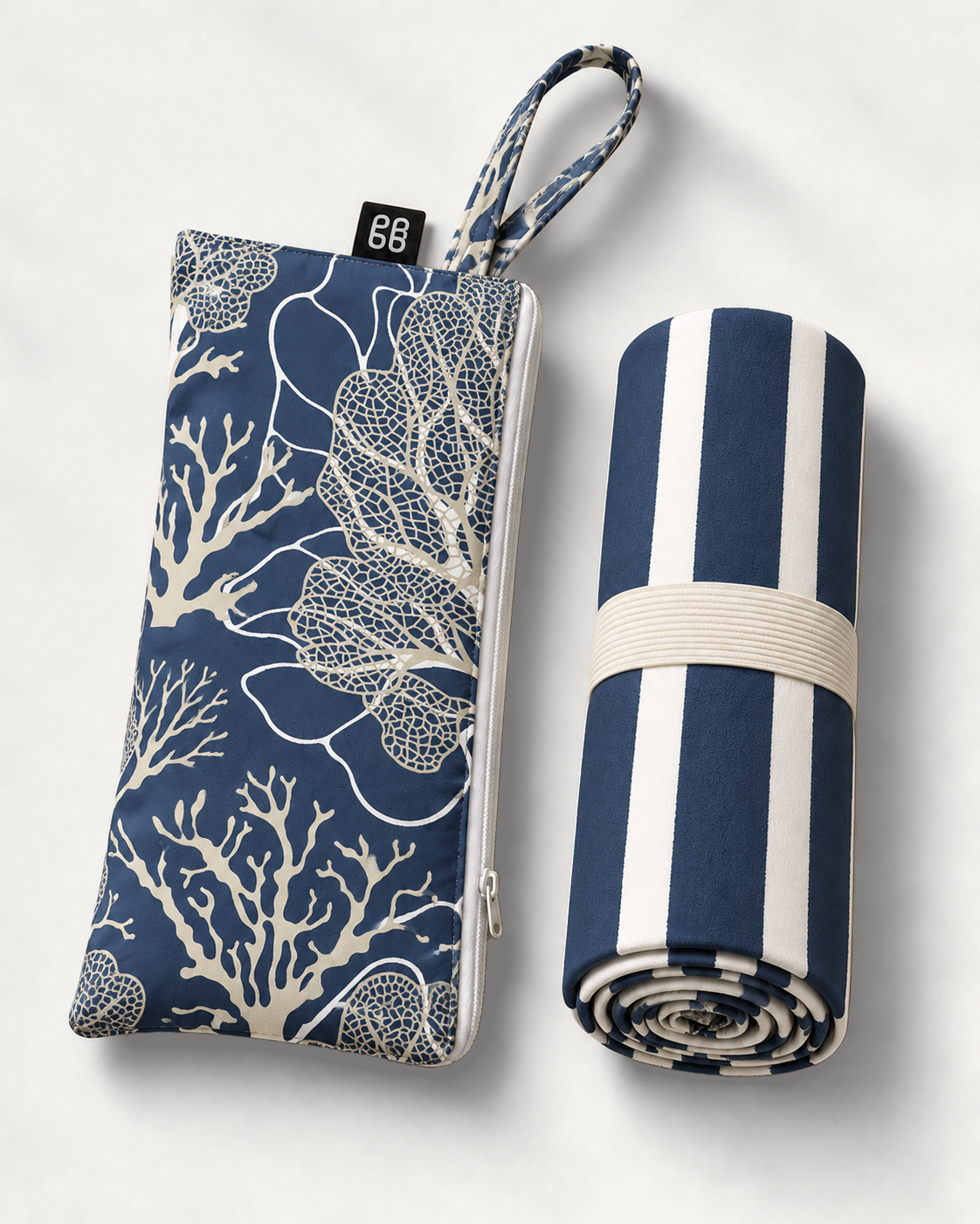 Submerge quick dry towel rolled with matching zip pouch by Grace Garrett