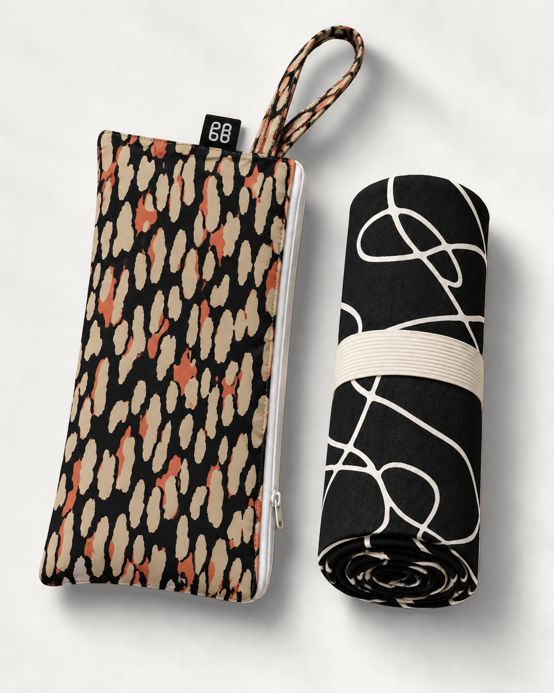 Wild Style quick dry towel rolled with matching zip pouch by Grace Garrett